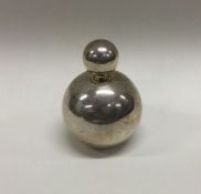 A large circular silver scent bottle. Approx. 65 grams. Est. £80 - £120.