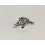 A silver model of a frog. Approx. 22 grams. Est. £20 - £30.