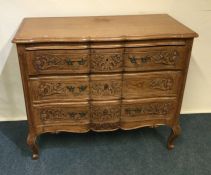 A Continental oak three drawer chest. Est. £80 - £