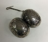 A Victorian silver tea infuser on suspension chain. By Job Frank Hall. Approx. 43 grams. Est. £150 -
