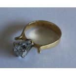 A good diamond single stone ring in 18 carat two c