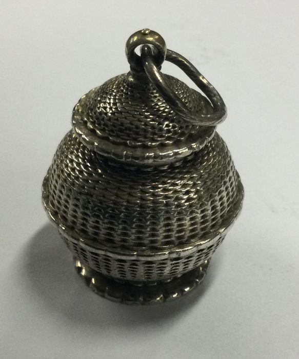 An 18th century silver pomander with screw top lid. Marked to base. Circa 1900. Approx. 34 grams.