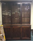 An early Victorian mahogany three door bookcase. E