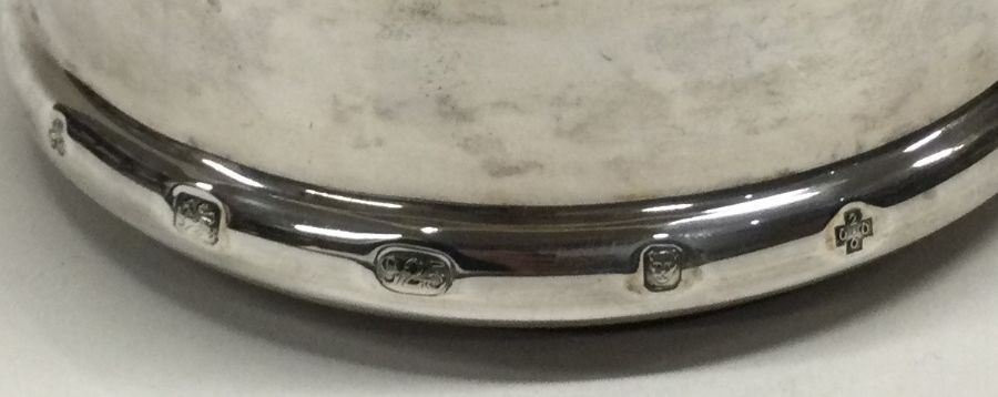 A heavy Millenium silver coaster. London 2000. By Carrs. Approx. 132 grams. Est. £80 - £120. - Image 2 of 2