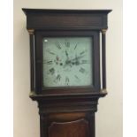 An oak cottage Grandfather clock with painted dial