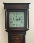 An oak cottage Grandfather clock with painted dial