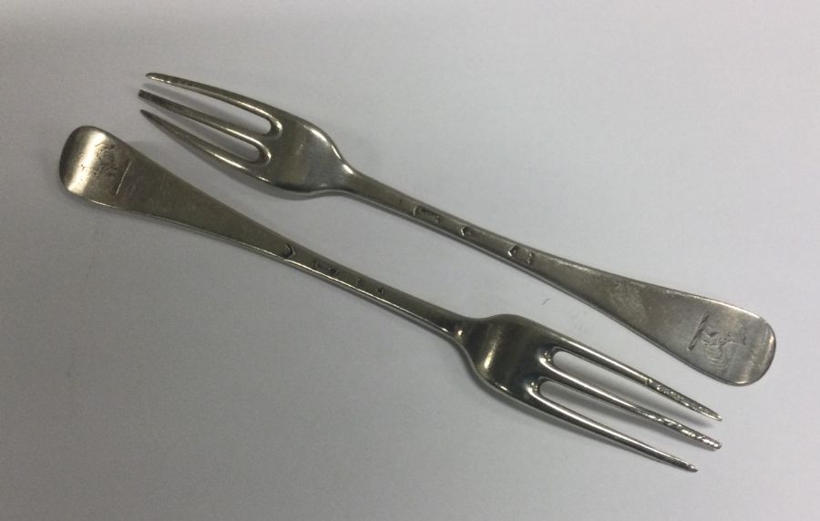 Two early three prong silver forks. London. Approx. 57 grams. Est. £100 - £120. - Image 2 of 2