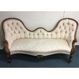 A large Victorian scroll back sofa. Est. £250 - £3