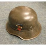 A German World War II helmet with Bulgarian emblem