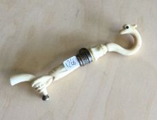 An old ivory pipe. Est. £20 - £30.