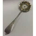 A pierced silver sifter ladle. Approx. 45 grams. Est. £60 - £80.