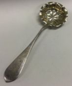 A pierced silver sifter ladle. Approx. 45 grams. Est. £60 - £80.