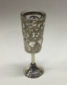 A Judaica silver cup with Star of David and vine decoration. Approx. 31 grams. Est. £20 - £30.