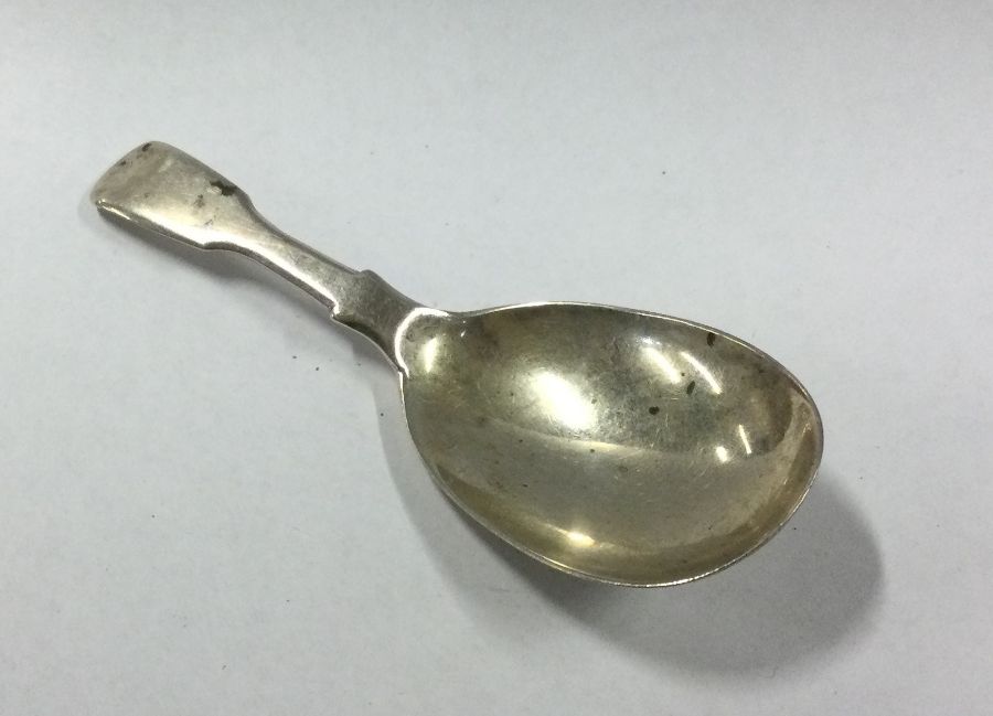 A heavy Victorian silver caddy spoon. London. By D