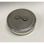 CHRISTIAN DIOR: A silver snuff box. Approx. 147 grams. Est. £100 - £120.