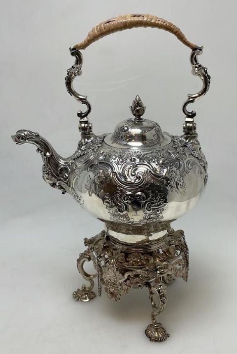 A good George II silver kettle on stand attractive