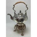 A good George II silver kettle on stand attractive