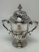 A heavy large Georgian silver two handled cup and