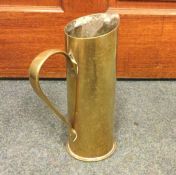 TRENCH ART: A heavy brass shell case in the form o