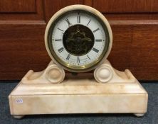 A French agate mantle clock with brass and enamell