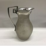 A Victorian silver mounted glass lemonade jug. Est. £150 - £200.