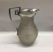 A Victorian silver mounted glass lemonade jug. Est. £150 - £200.