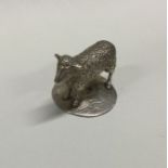 A heavy silver model of a sheep. Approx. 80 grams. Est. £60 - £80.