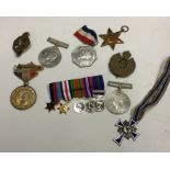 A box containing old dress medals etc. Est. £20 -