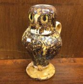 An old Ironstone jug in the form of an owl with te