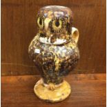 An old Ironstone jug in the form of an owl with te