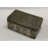 A Dutch 19th Century chased figural box. Marked to base. Approx. 91 grams. Est. £150 - £180.