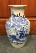 A Chinese blue and white vase of typical form. App