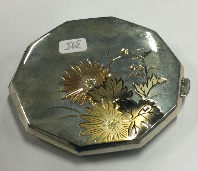 A finely engraved mixed metal Japanese compact. Approx. 97 grams. Est. £150 - £180. - Image 2 of 2