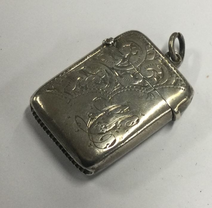 An engraved silver vesta case. Birmingham Approx. 12 grams. Est. £25 - £35.