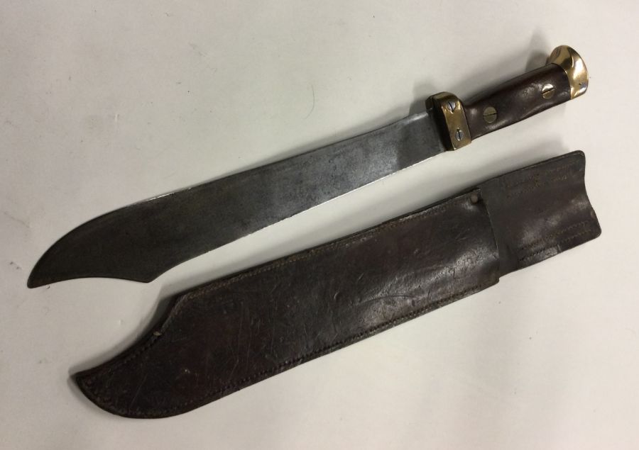 An old Bowie knife in leather sheath. Est. £30 - £