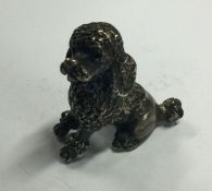 A silver figure of a poodle. Marked to base. Approx.17 grams. Est. £20 - £30.