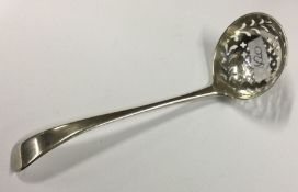 A Georgian silver OE pattern sifter spoon. London.