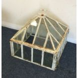 A small glass garden greenhouse. Est. £30 - £50.