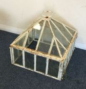 A small glass garden greenhouse. Est. £30 - £50.