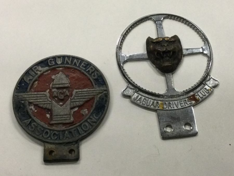 A Jaguar Driver's Club badge together with an Air