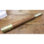 An old brass leather bound telescope. By Ross of L