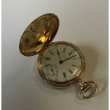 A ladies 14 carat gold Waltham fob watch with engr