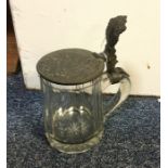 A Continental glass beer stein with hinged lid dec