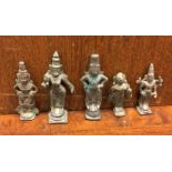 A group of five bronze tribal ladies. Est. £10 - £20.