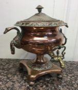 A good Antique copper and brass samovar with vine