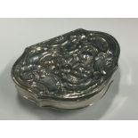 A mid- 18th Century Georgian chased silver snuff box. Maker’s mark ‘EC’ to lid. Approx. 39 grams.