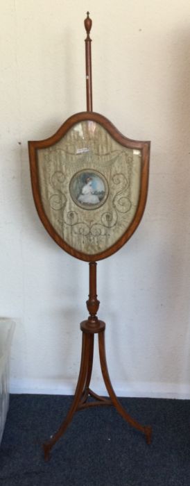 An attractive Victorian pole screen. Est. £100 - £