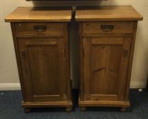 A pair of pine bedside cabinets. Est. £40 - £60.