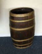 An old brass mounted barrel. Est. £30 - £50.