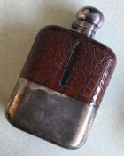 A massive silver and crocodile skin hip flask with